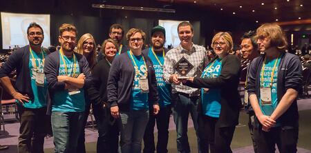 media junction team holding the COS Website Performance Award