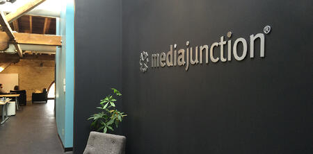 media junction sign in office entryway. 