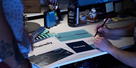 Media Junction brand team exploring logo design options for Therady visual identity