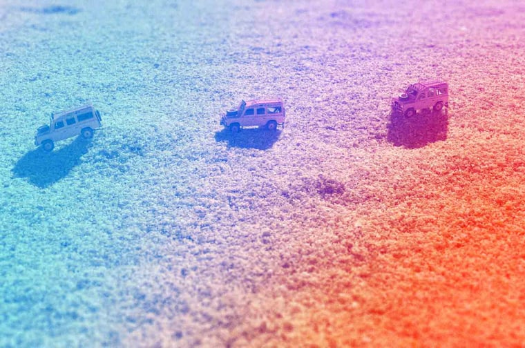 Jeeps going through terrain. 