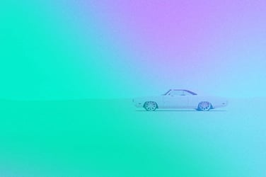 Car cruising through the desert. 
