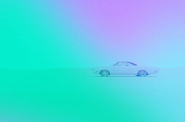 Car cruising through the desert. 