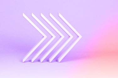 Chevron arrows pointing to the right. 
