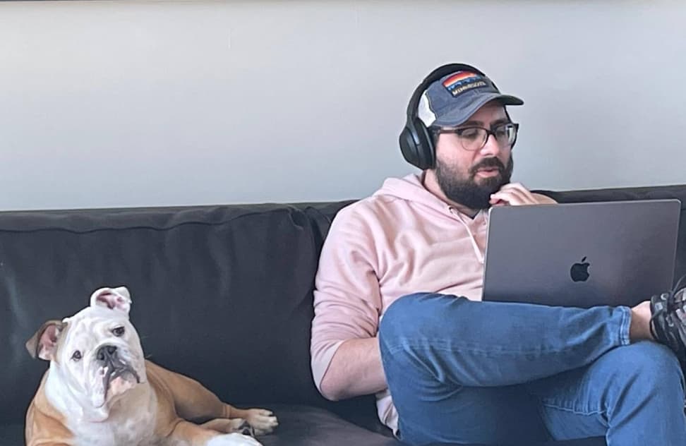 Media Junction team member Tony with a family pet