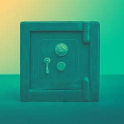 vintage safe on gradient background representing financial security