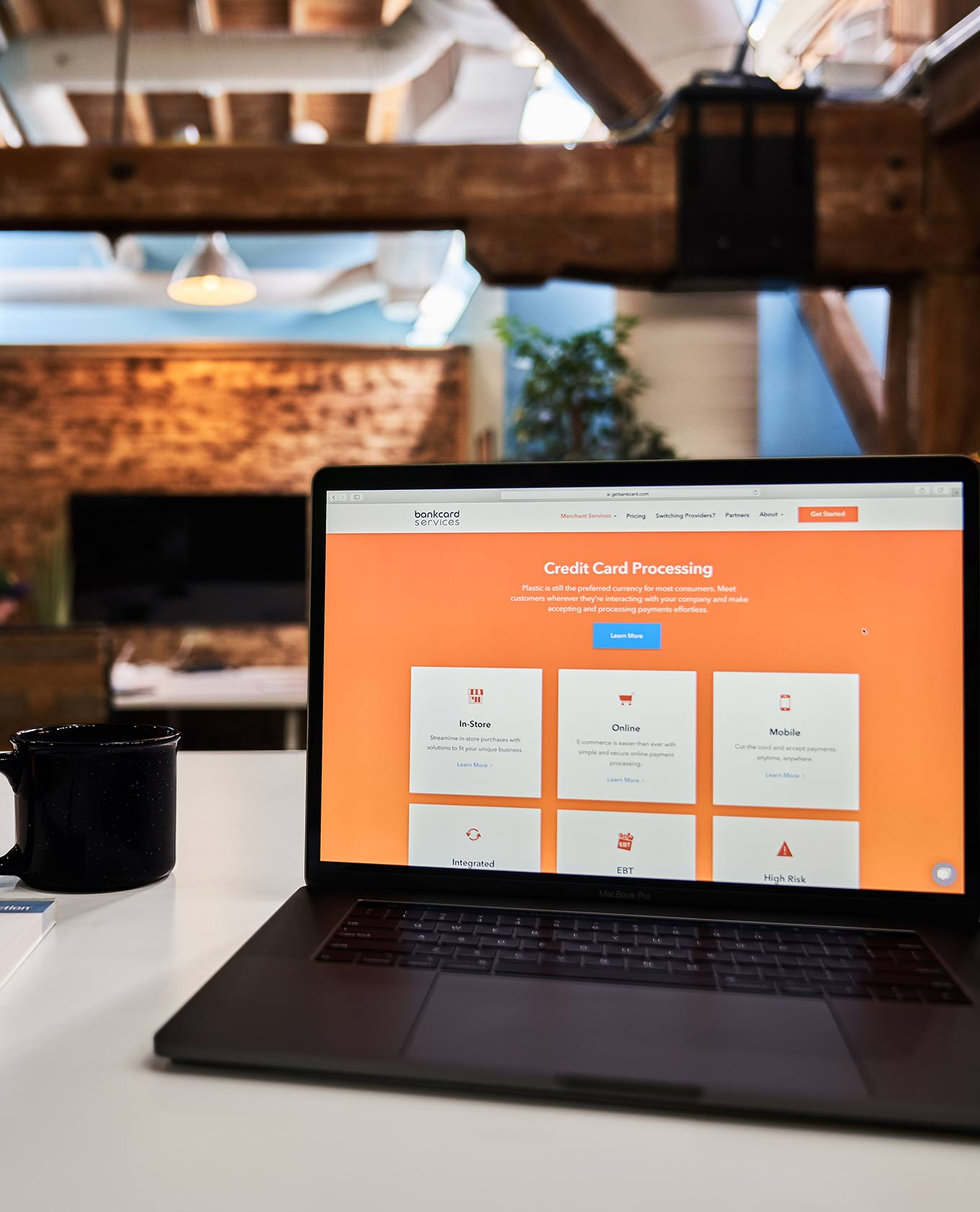 Example of a website media junction designed. The website is displayed on a MacBook pro laptop